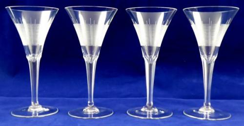 Four liqueur glasses