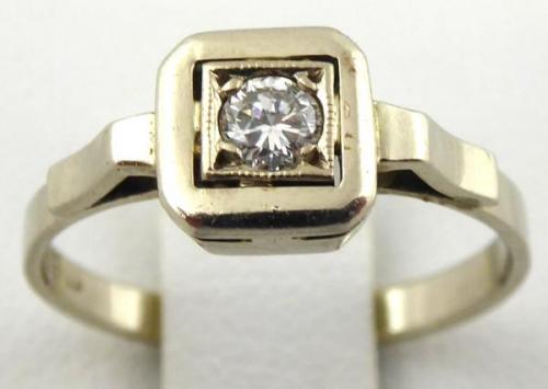 White gold ring with natural diamond