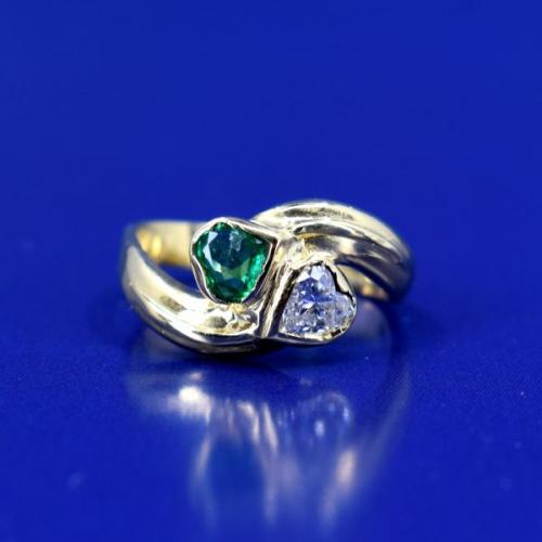 Gold ring with emerald and diamond