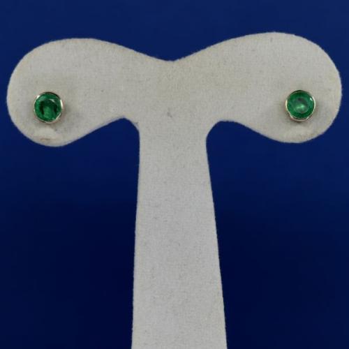White gold earrings with emeralds